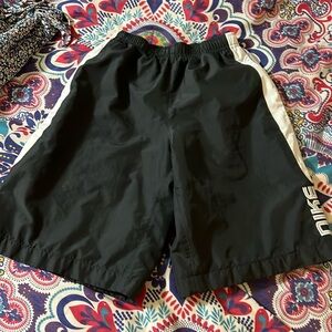 Boys lined black Nike shorts size small (8) with pockets and drawstring waste
